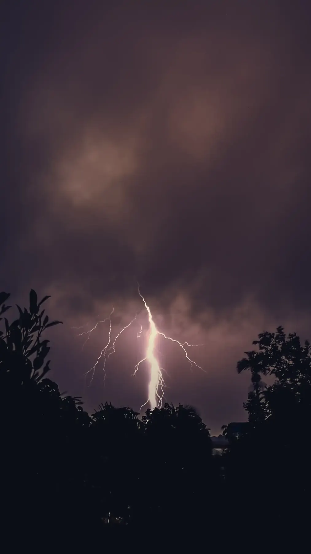 A lightning bolt in a dark stormy sky