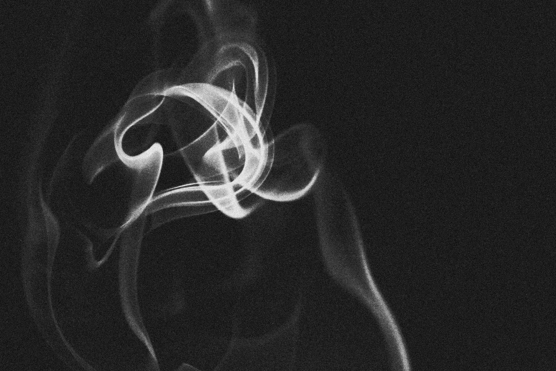 Abstract smoke forming a swirling knot
